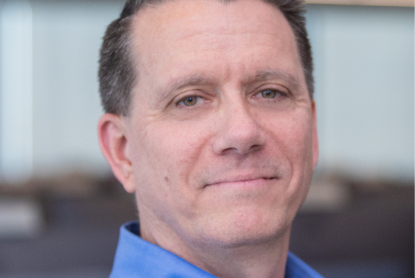 a headshot image of john guiney